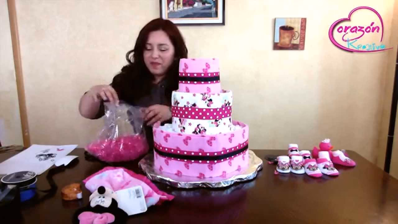 ¿Cómo se puede adornar un pastel con 6 pañales o paños?