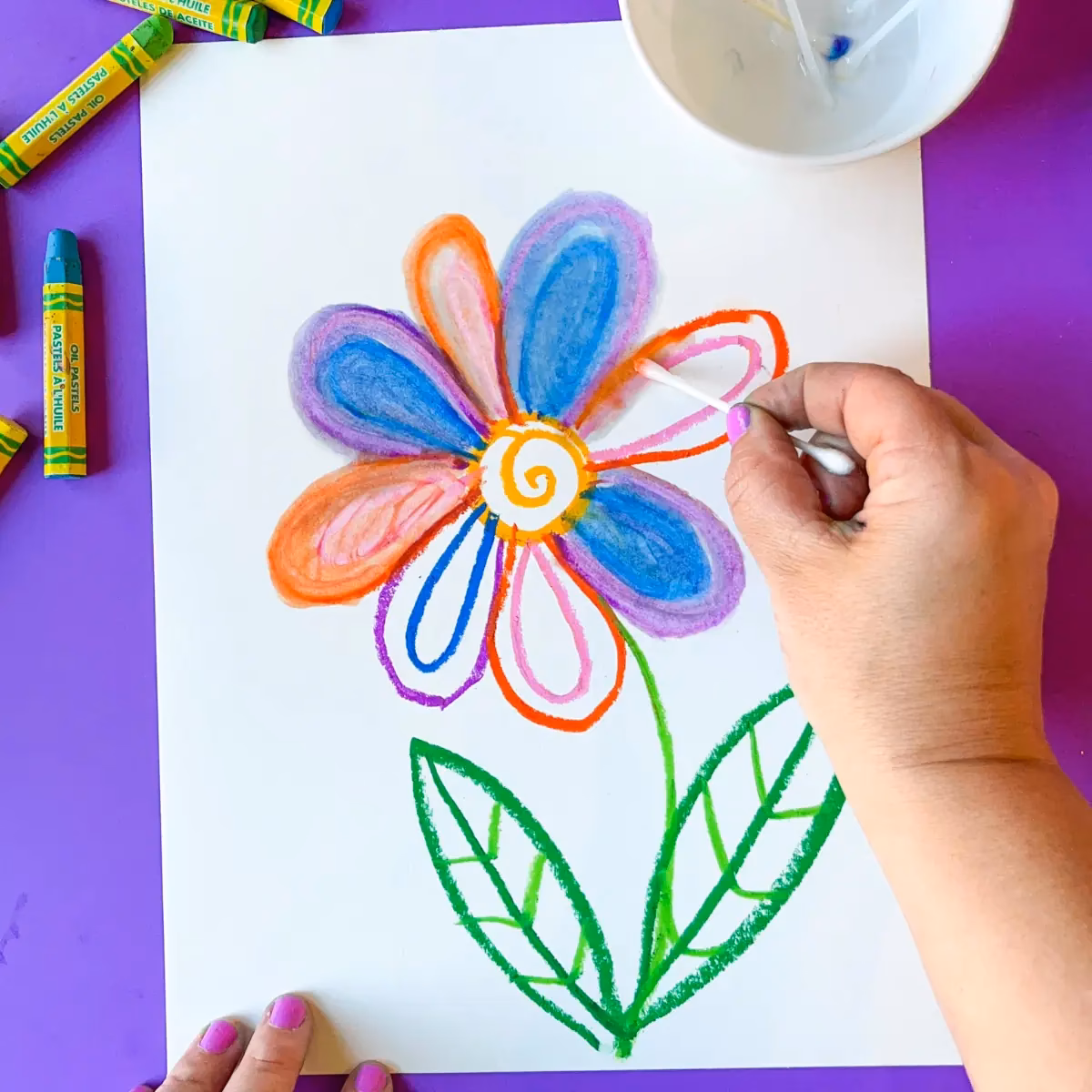 How do you color with oil pastels?