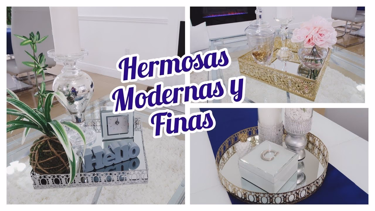 ¿Cómo decorar un baño con dos espejos con marco dorado?