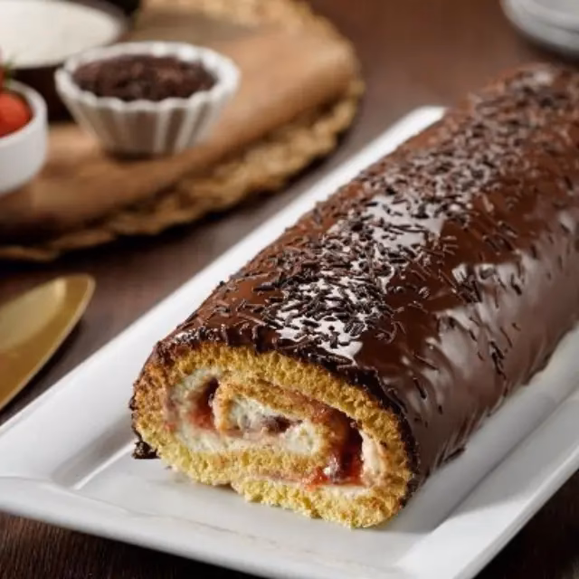 ¿Cómo preparar pastel niño envuelto con mermelada de fresa y Coco?