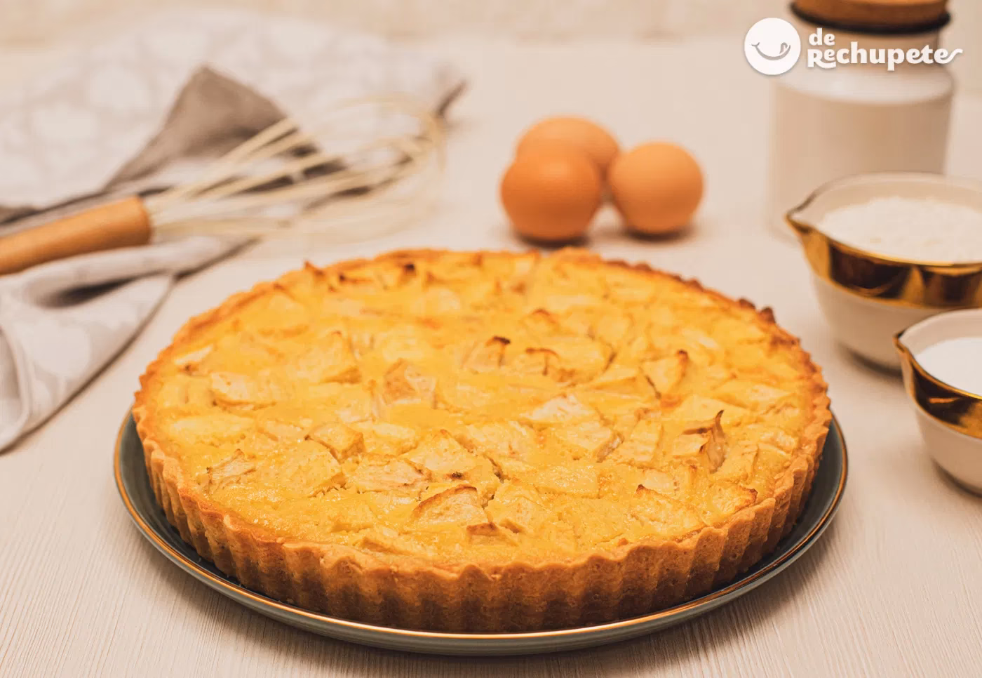 ¿Cómo se prepara la crema de almendras de la tarta de manzana francesa?