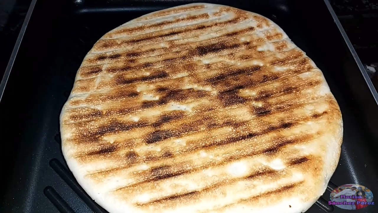 ¿Cómo se cocina un asado en la parrilla?