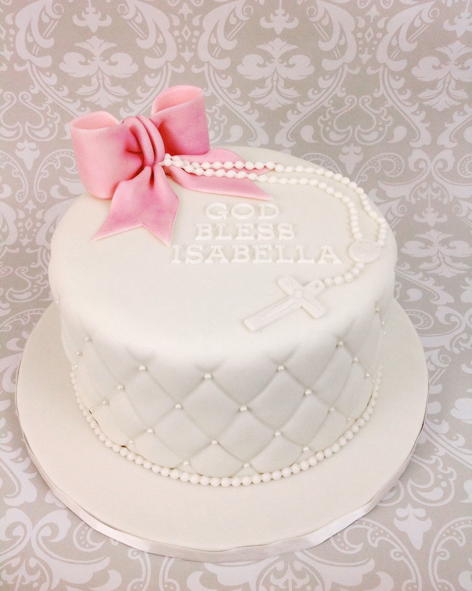 ¿Cuál es la función de la túnica blanca en el bautismo?