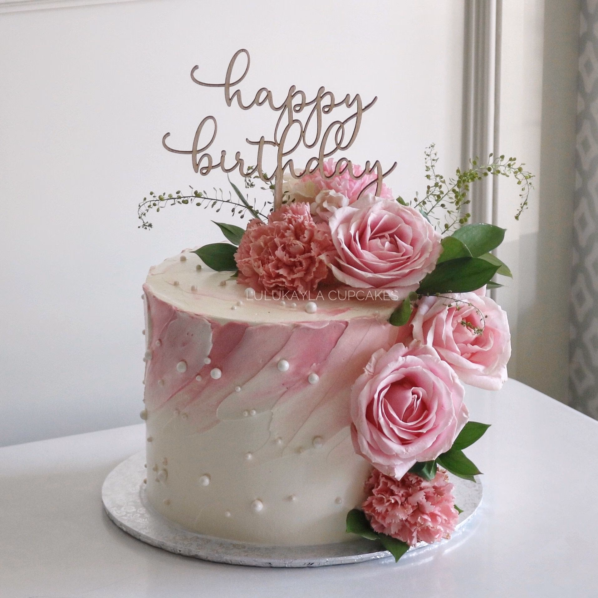 ¿Cómo hacer una tarta de cumpleaños Rosa?